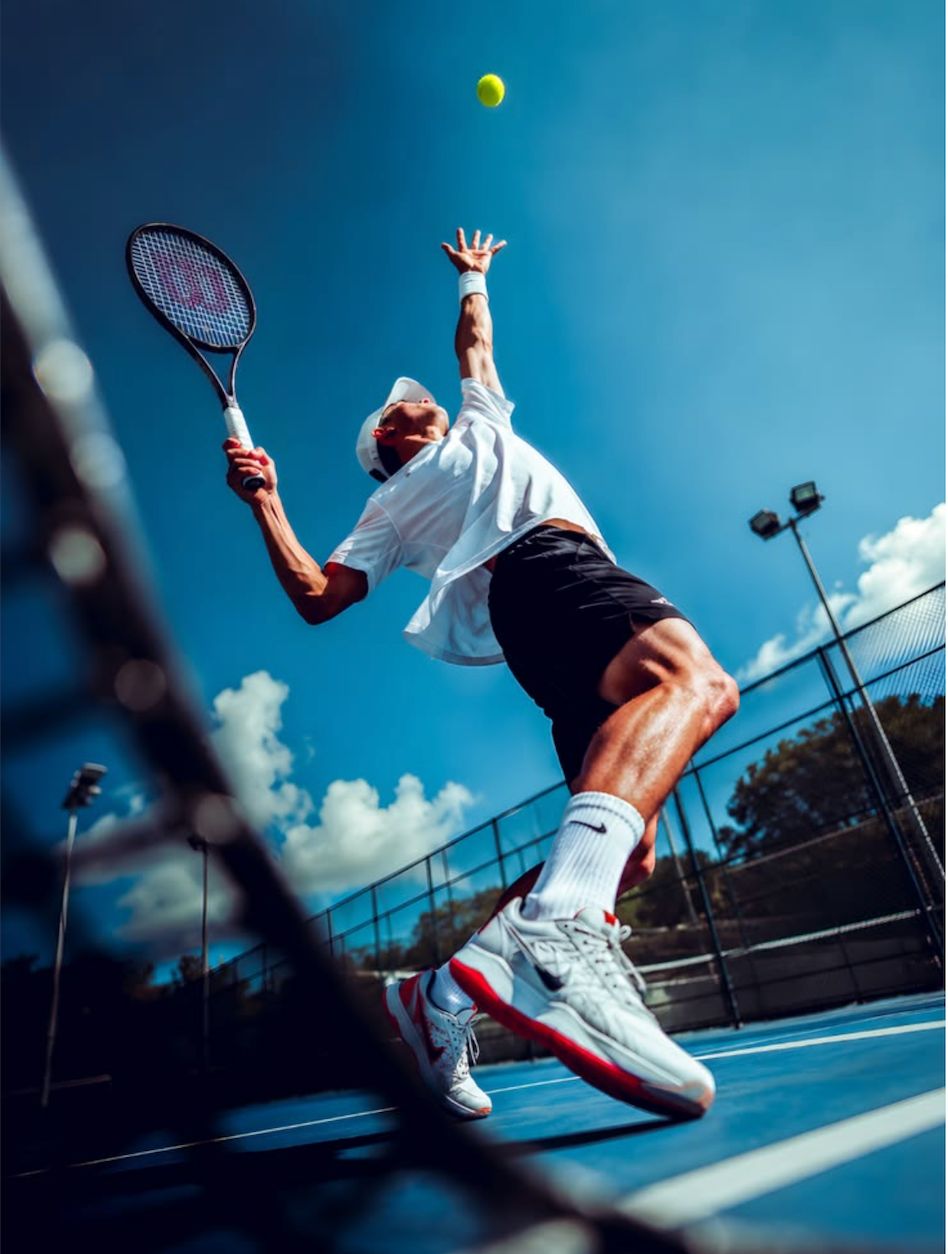 Tennis player serving